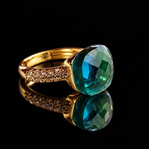 Ring in zilver geelgoud verguld model Pomellato met blauwe steen en cubic zirconia