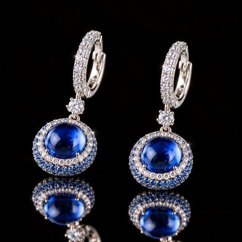Zilveren oorringen oorbellen gezet met blauwe ronde steen en cubic zirconia